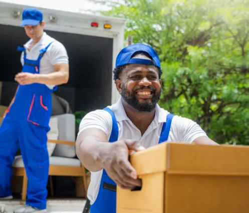 two movers moving boxes